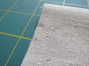 how to make a diy banner out of thrift store muslin