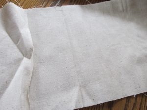 how to make a diy banner from thrift store muslin