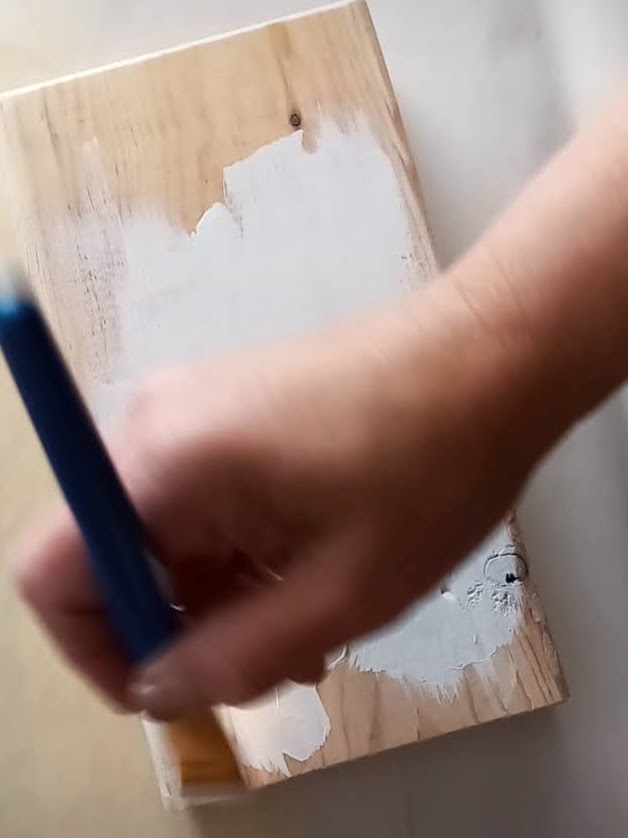 Painting scrap wood with white acrylic paint