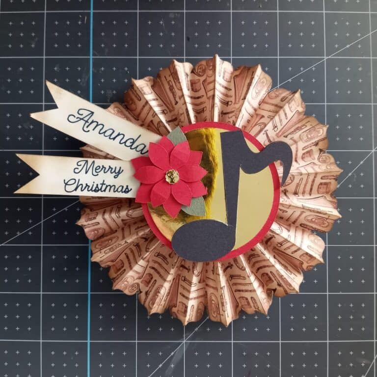 Crafting Musical Elegance: DIY Musical Rosette Poinsettia Gift Tag